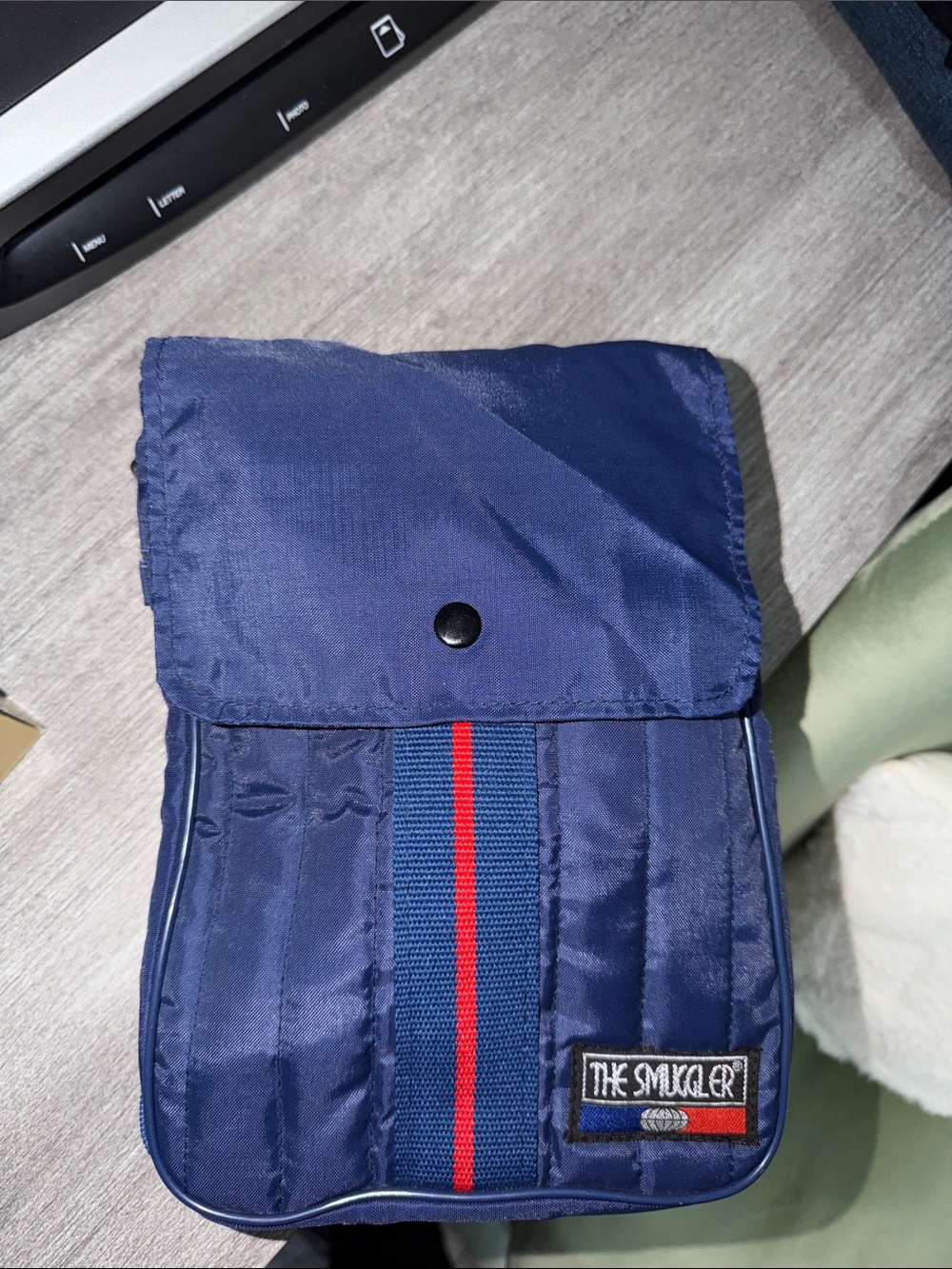 Smuggler navy zipper compact travel bag with lots of pockets